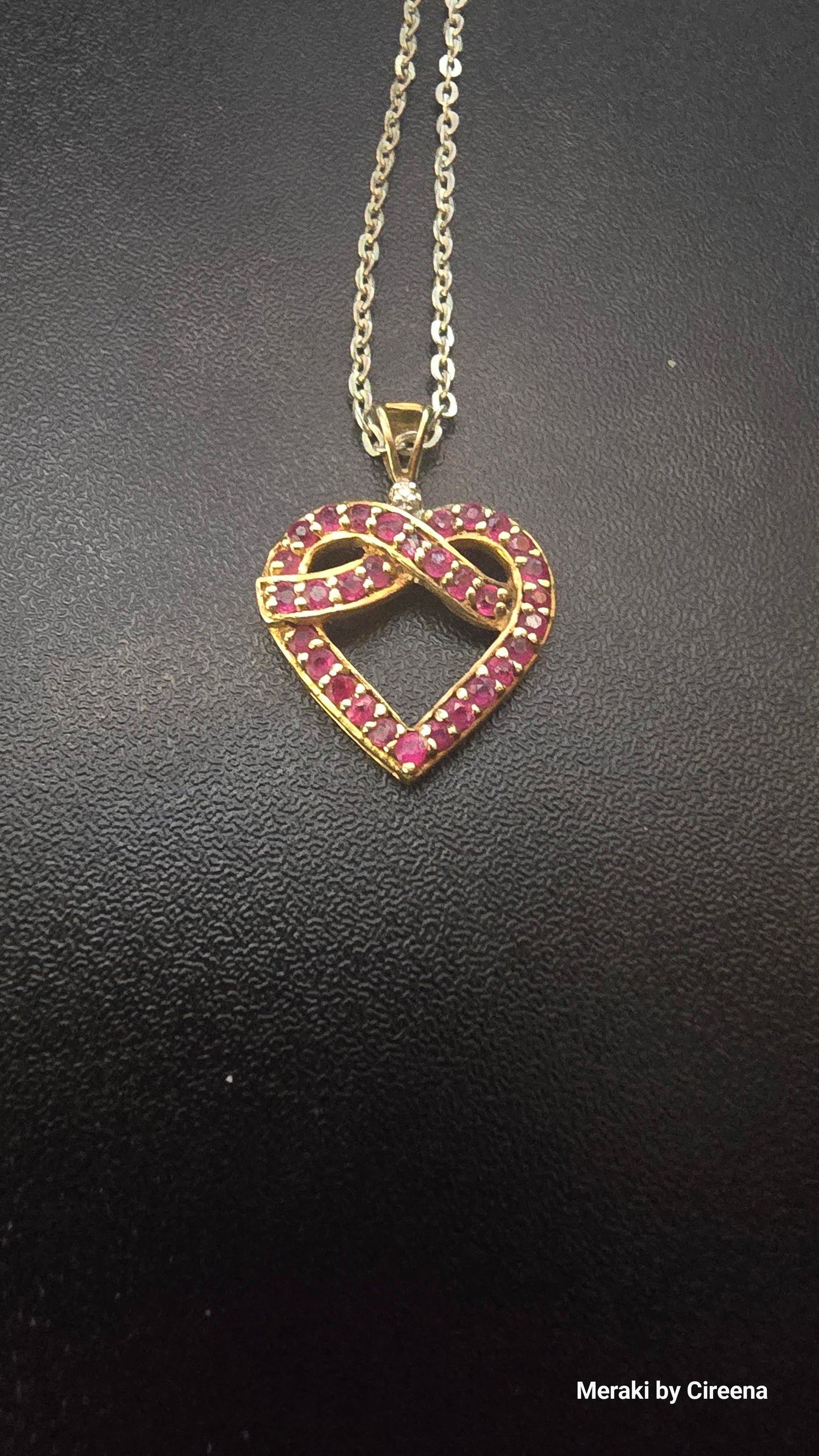 Vintage Ruby and Diamond 10K Gold Embracing Heart Pendant