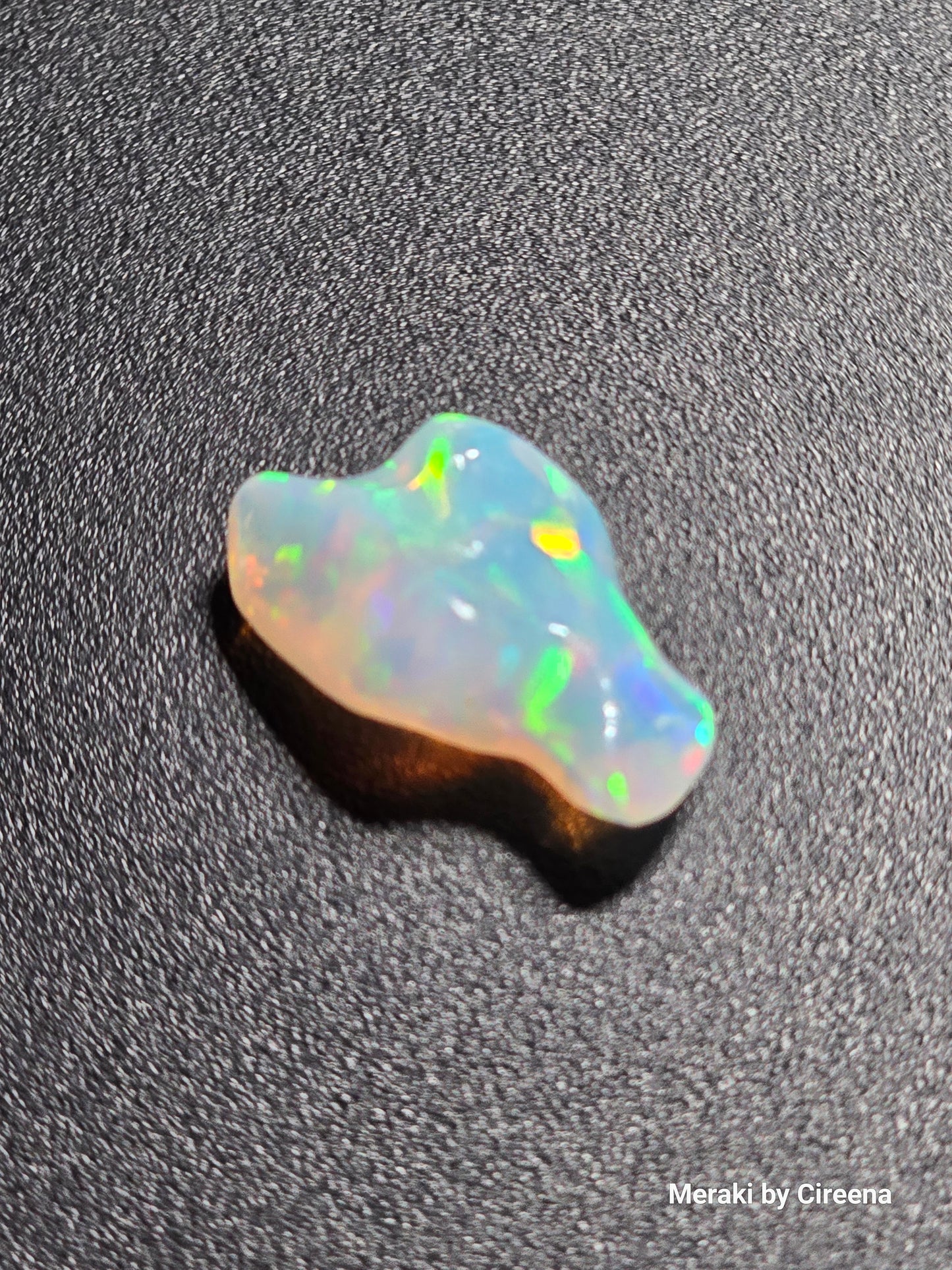 Welo Opal Freeform Carving with Honeycomb pattern- 9.0 ct