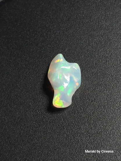 Welo Opal Freeform Carving with Honeycomb pattern- 9.0 ct