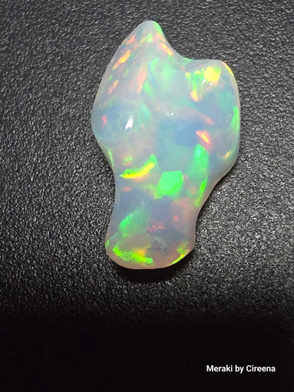 Welo Opal Freeform Carving with Honeycomb pattern- 9.0 ct