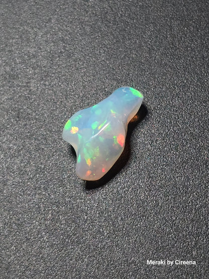 Welo Opal Freeform Carving with Honeycomb pattern- 9.0 ct