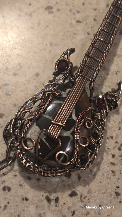 Stonebreaker - Thunderstorm inspired Guitar Necklace