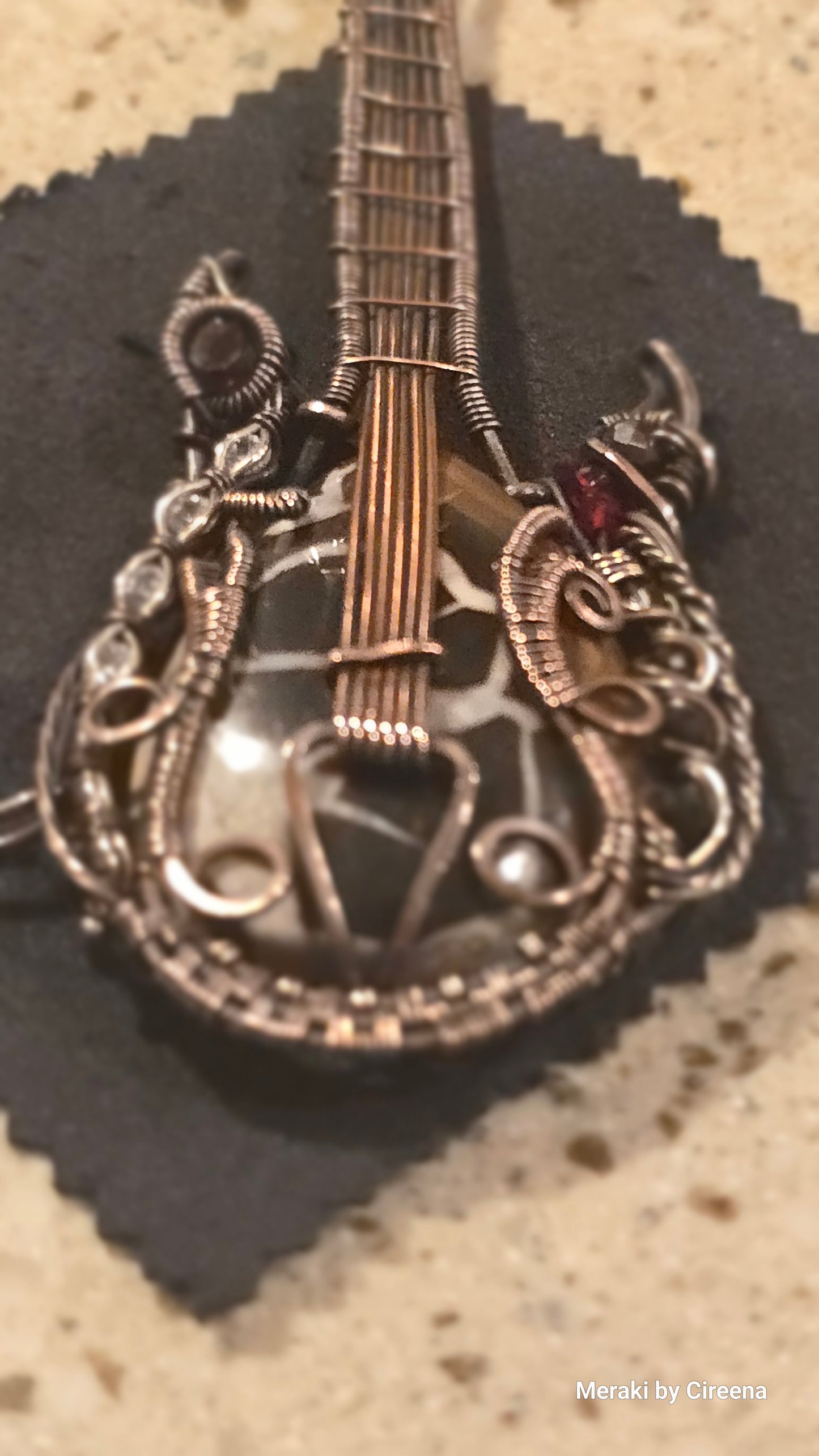 Stonebreaker - Thunderstorm inspired Guitar Necklace