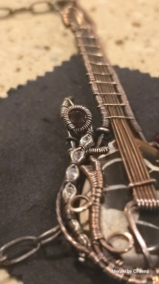 Stonebreaker - Thunderstorm inspired Guitar Necklace